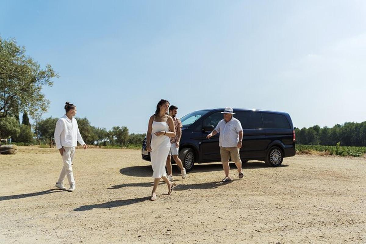 a group of people walking in front of a van