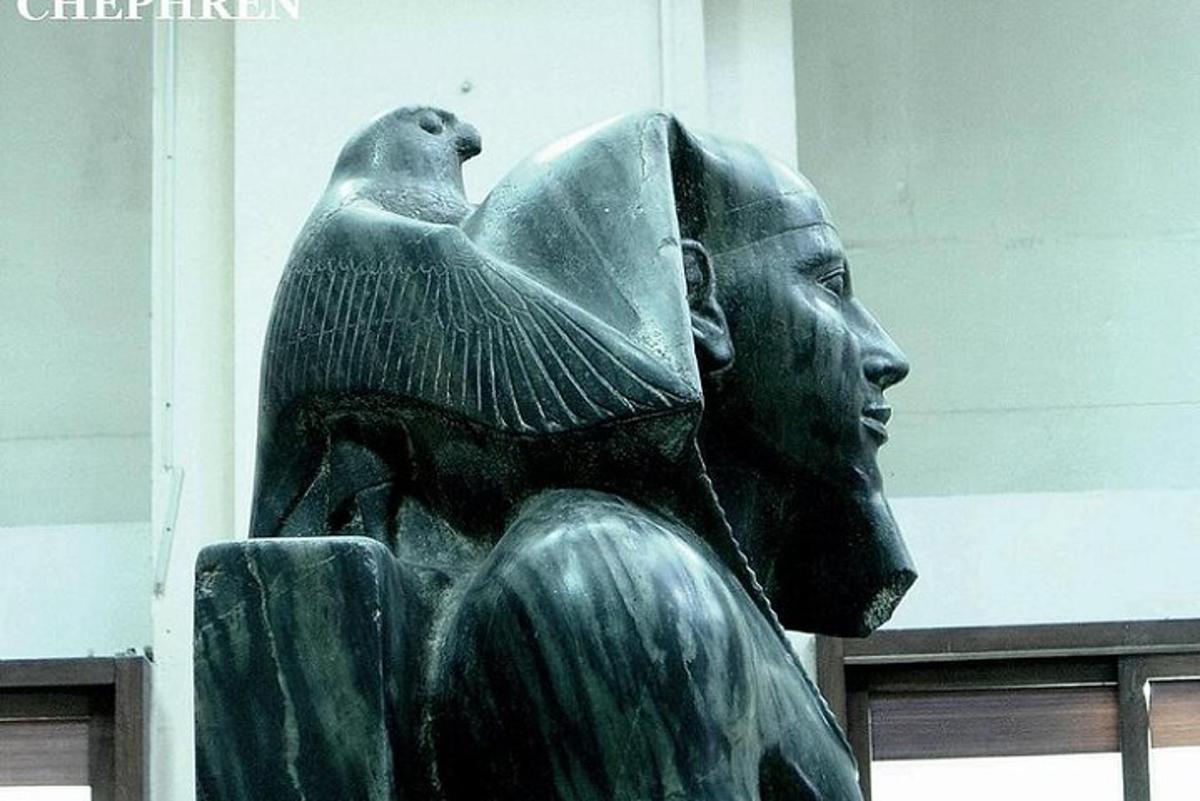 a statue of a man with a bird on his shoulder
