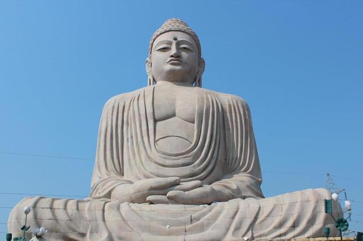 a large statue of a buddha sitting on top