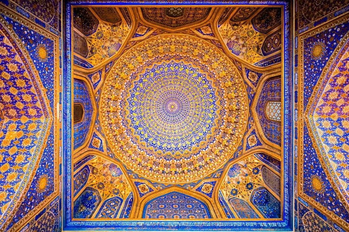 a ceiling of a building with a blue and gold