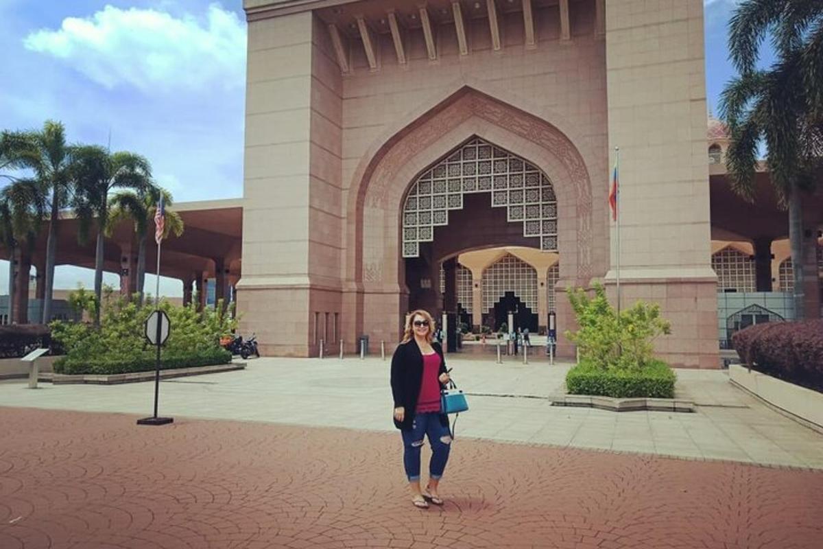 a woman standing in front of a building