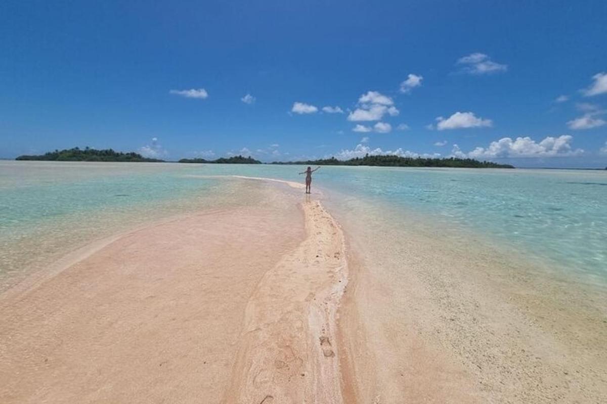 a person standing on a beach in the water