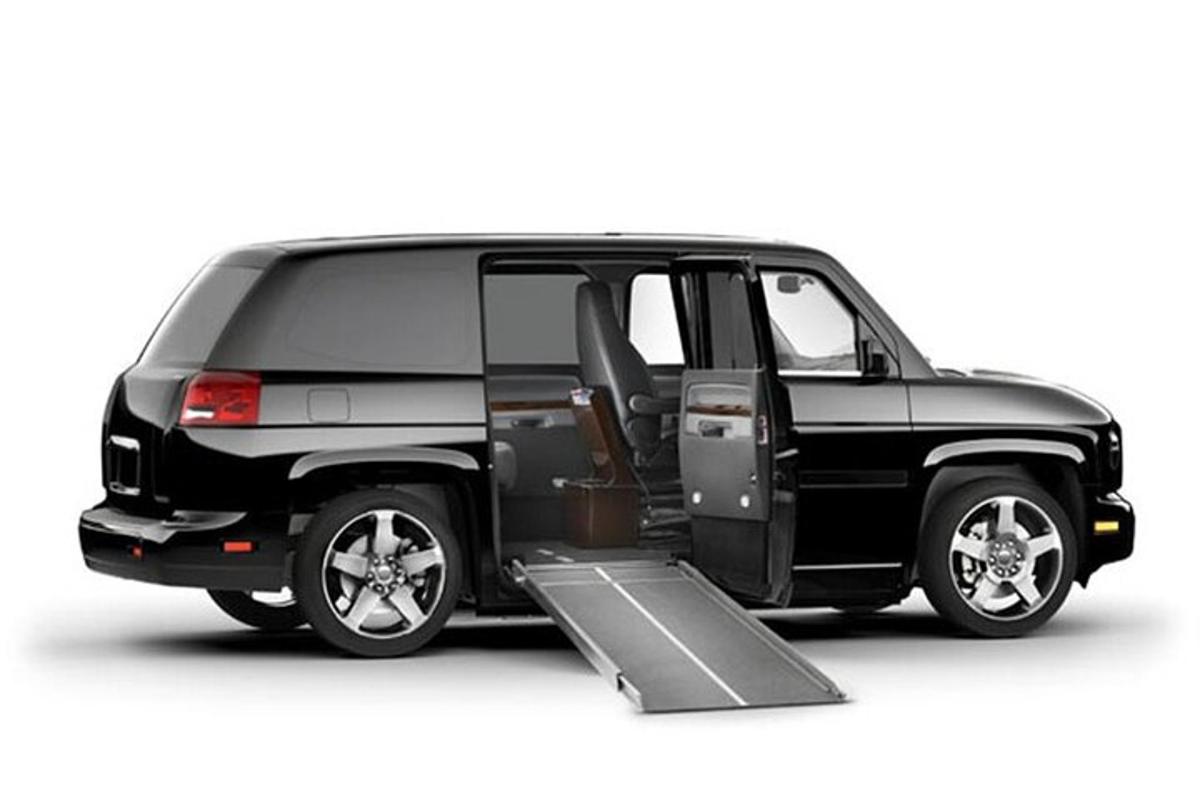 a black van with its door open on a white background
