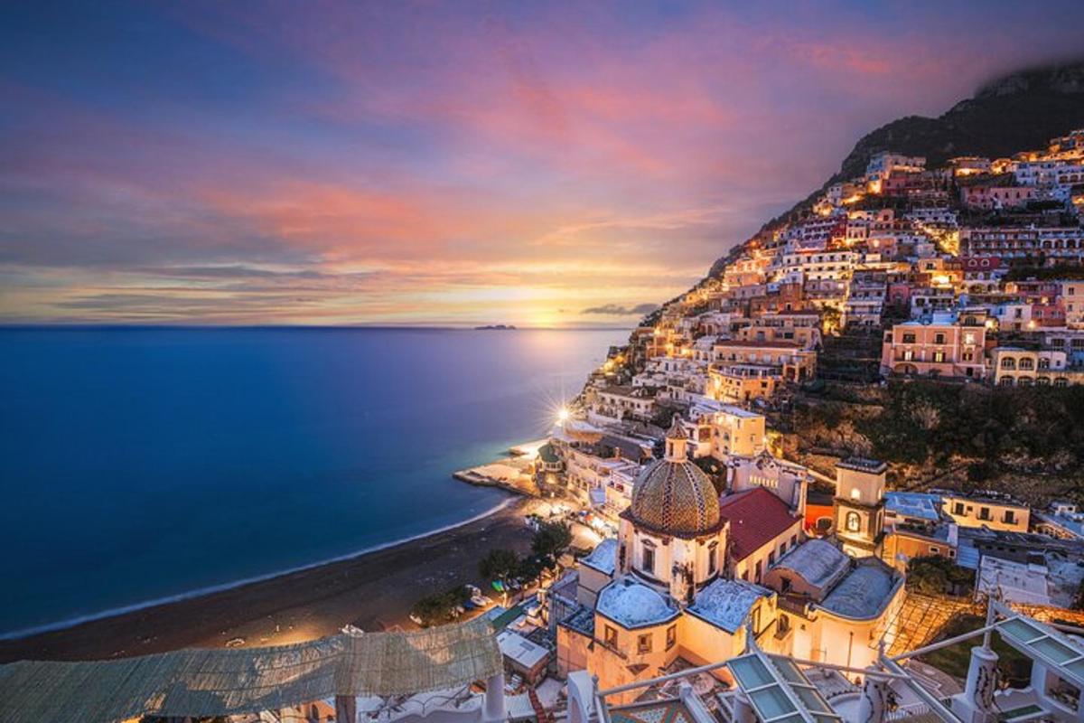 a view of a town on the side of a mountain