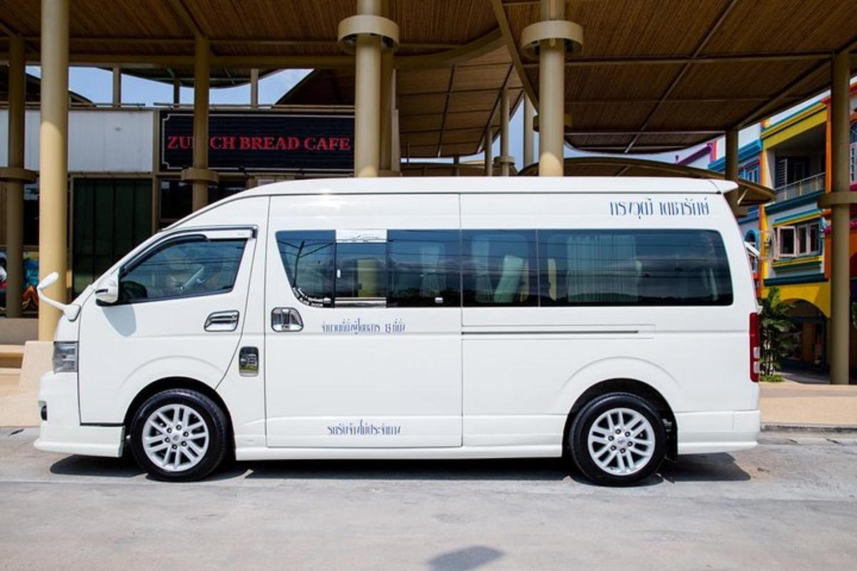 a white van parked in front of a building