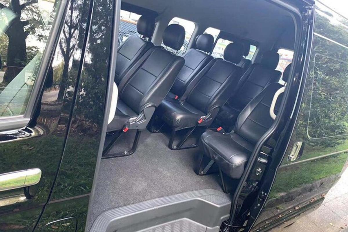 an open back of a van with empty seats