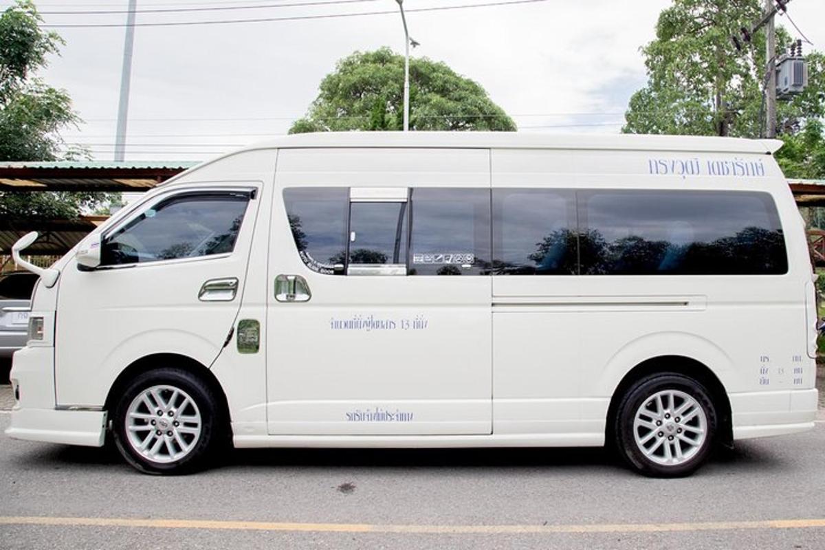 a white van parked in a parking lot