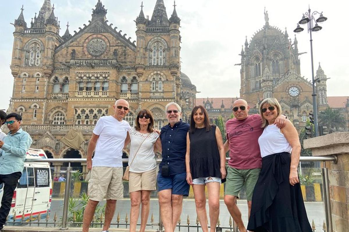 a group of people standing in front of a building
