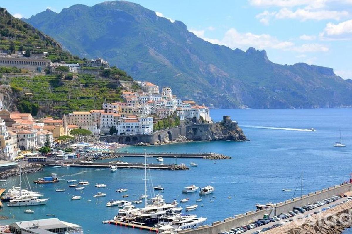 a group of boats docked in a harbor