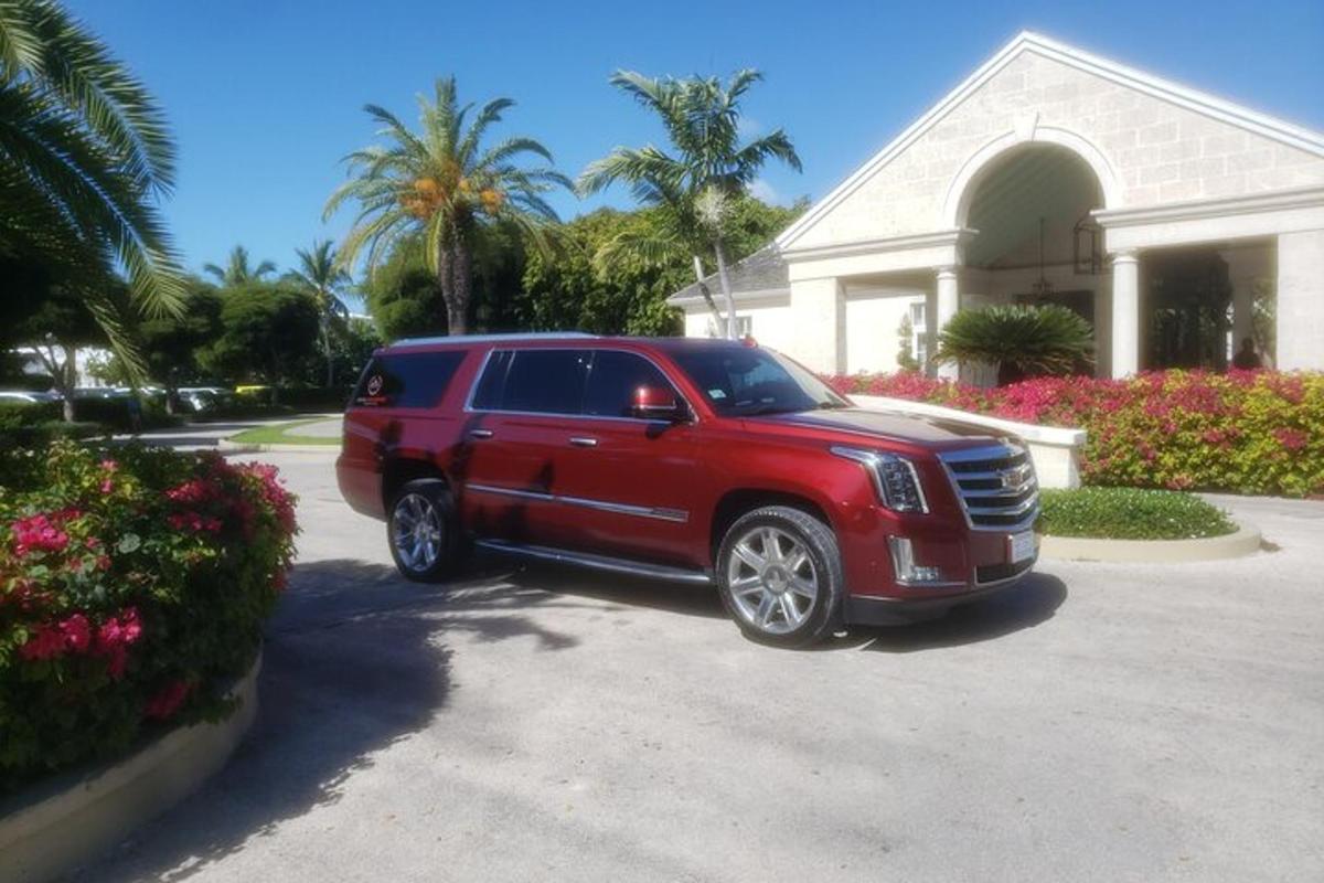 a red truck parked in front of a house