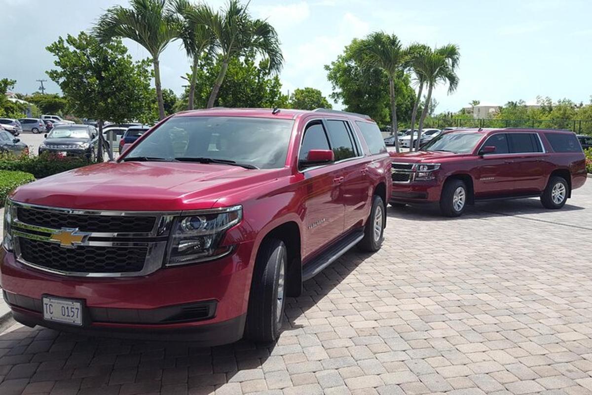 two trucks are parked in a parking lot