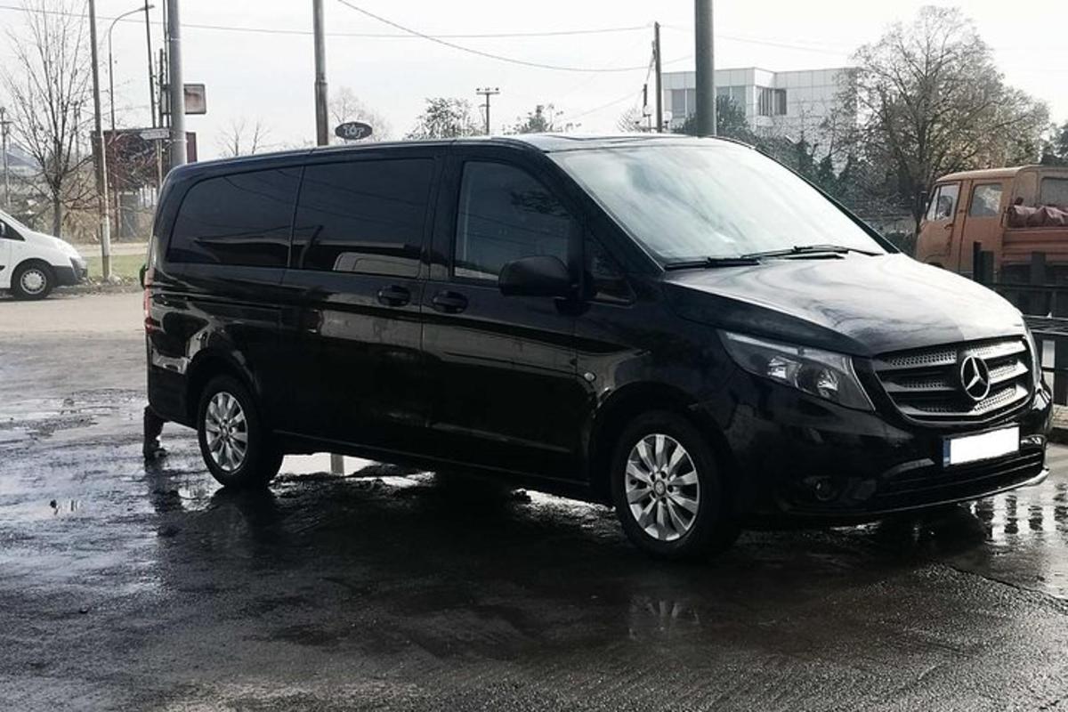 a black van parked in a parking lot