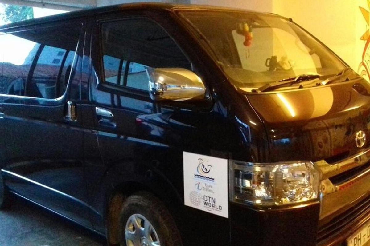 a blue van is parked in a garage