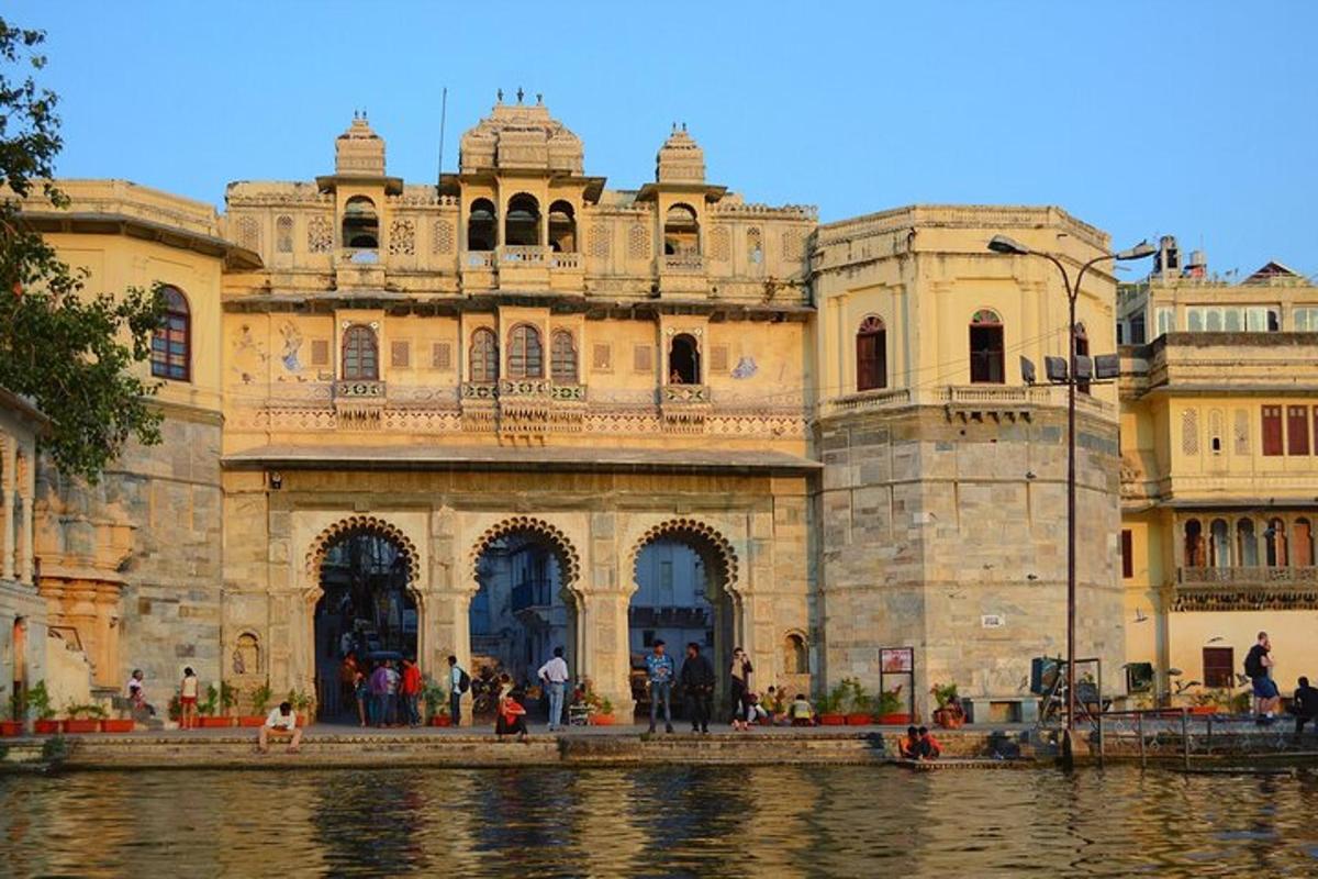a large building next to a body of water
