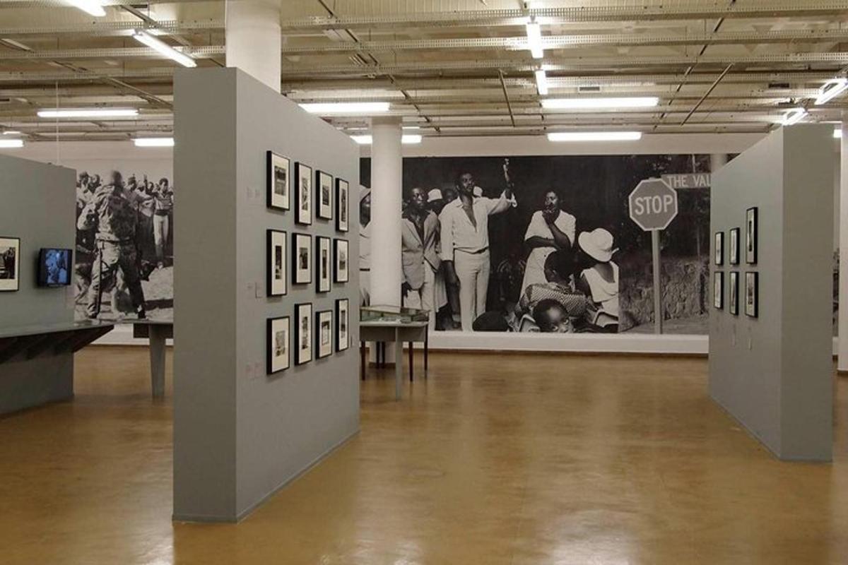 a room with pictures on the walls of a museum