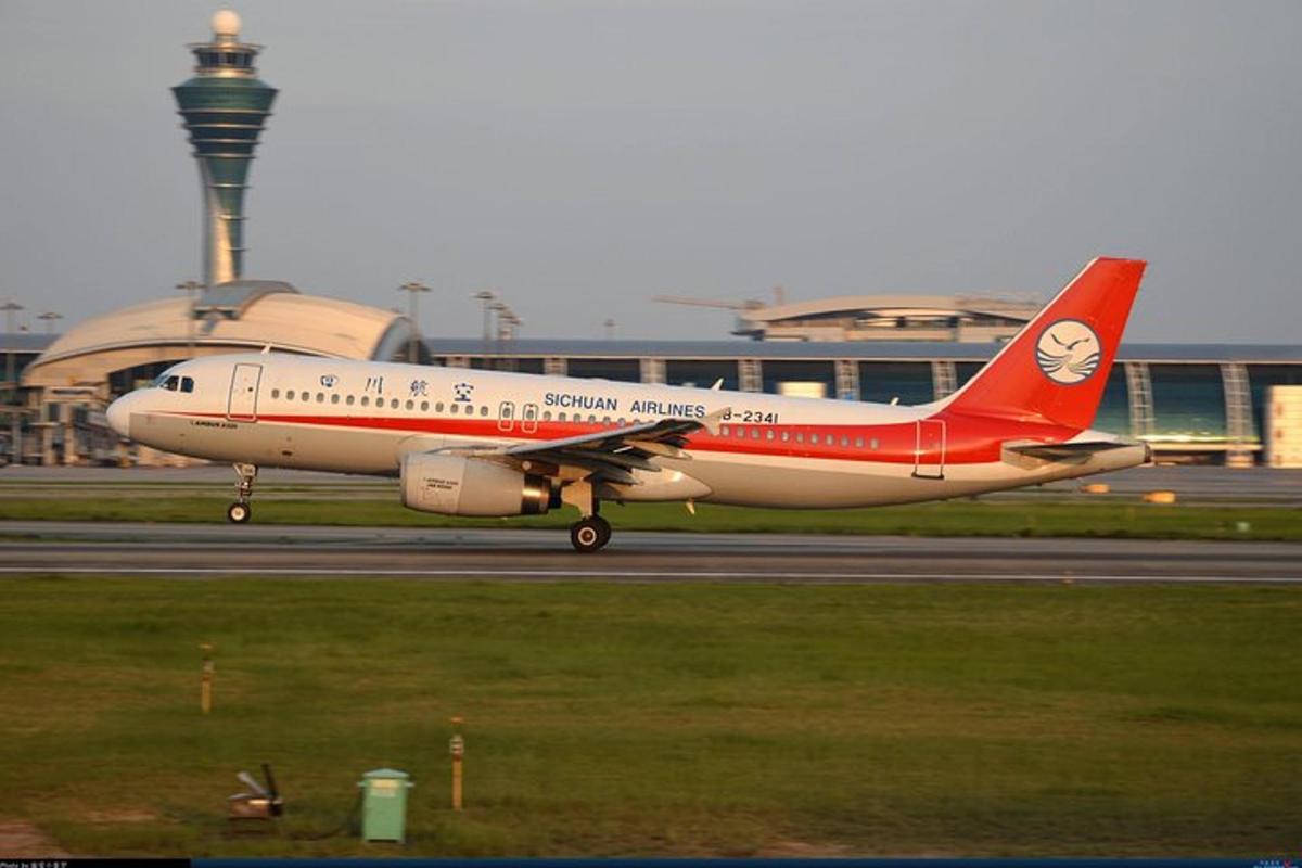 an airplane is taking off from an airport runway