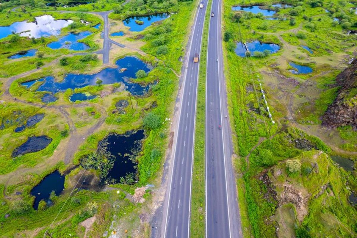 an overhead view of a road with water channels