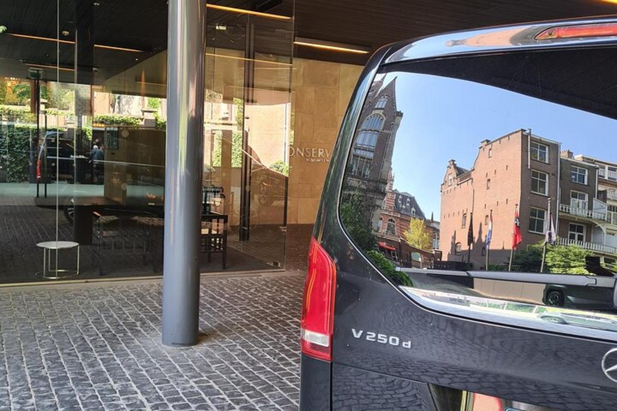 a car parked in front of a store window
