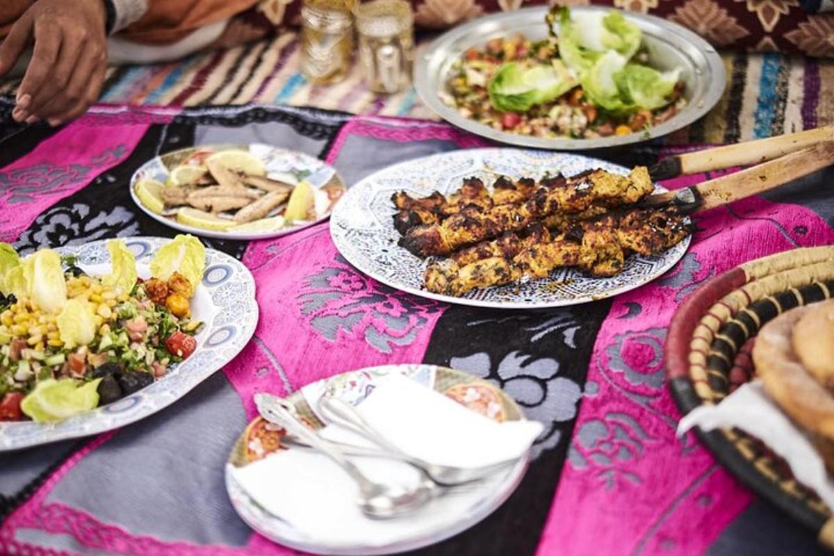 a table with plates of food on top of it
