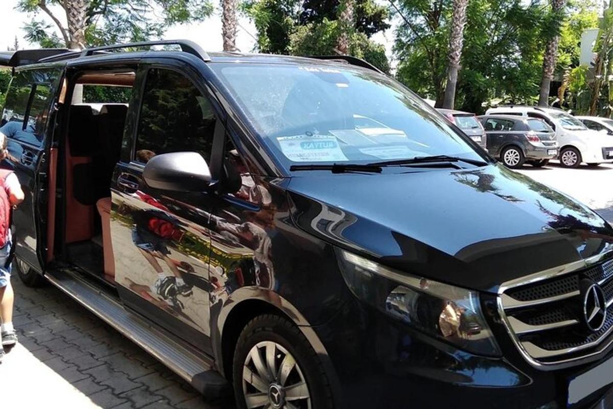 a black car with a wrap on the side of it