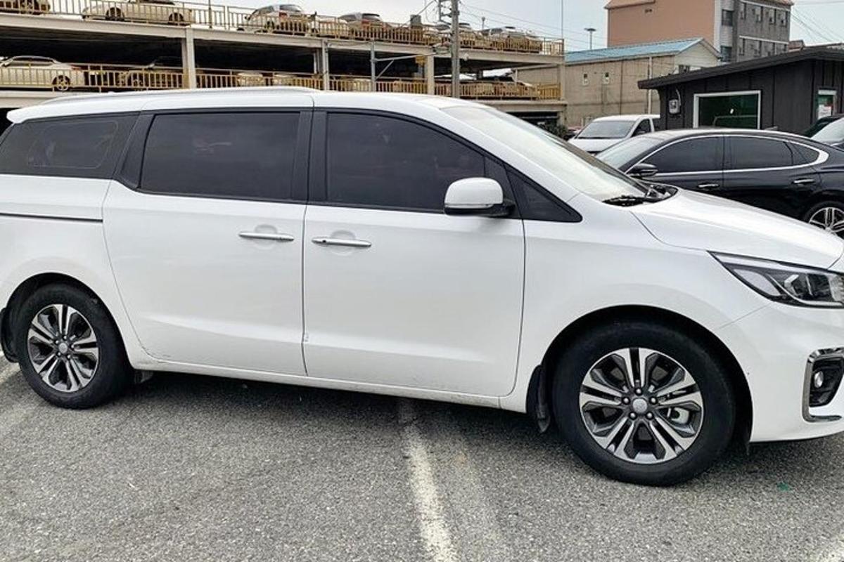 a white van parked in a parking lot