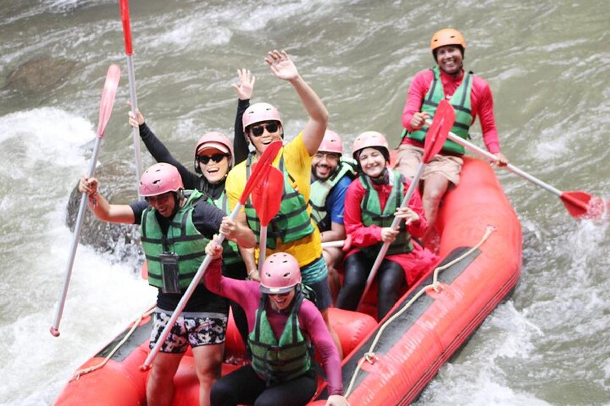 a group of people on a raft in the water