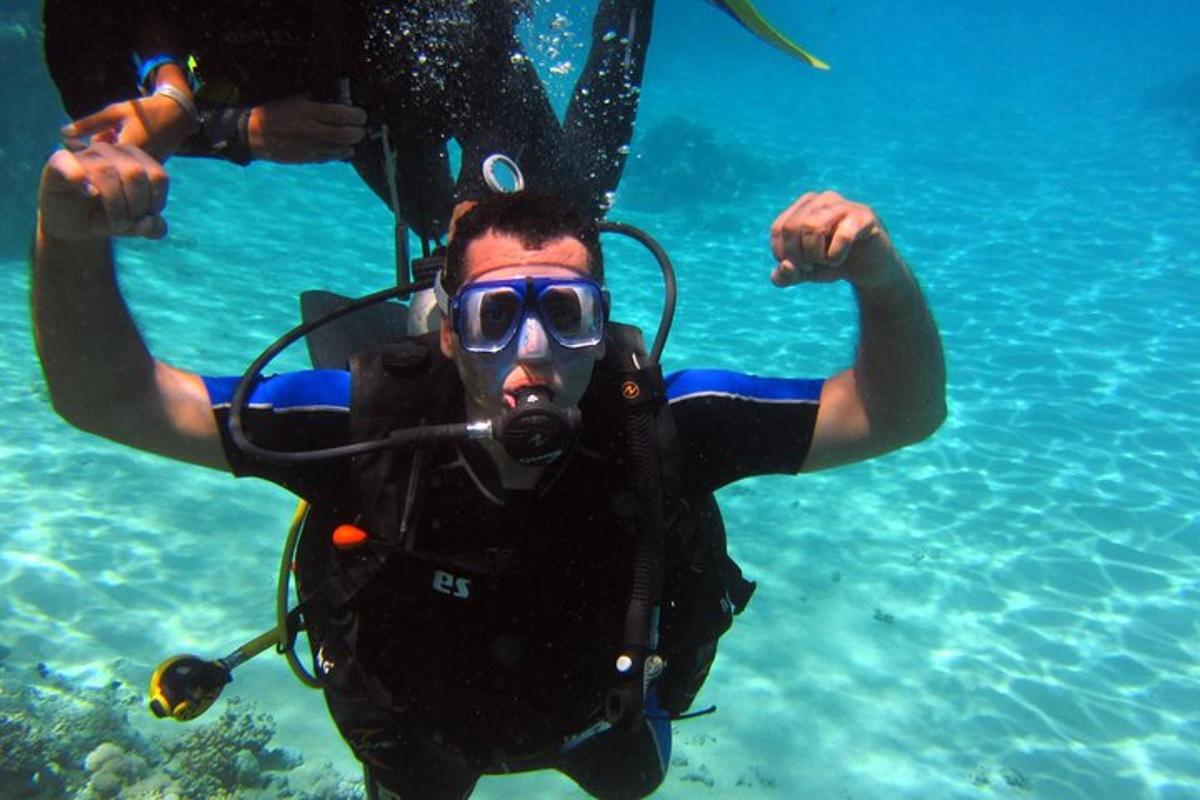 a man in a diving mask in the water