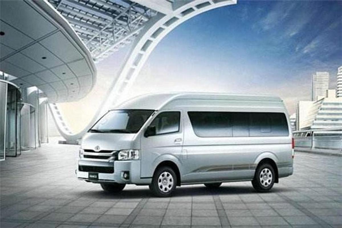 a silver van is parked in a building
