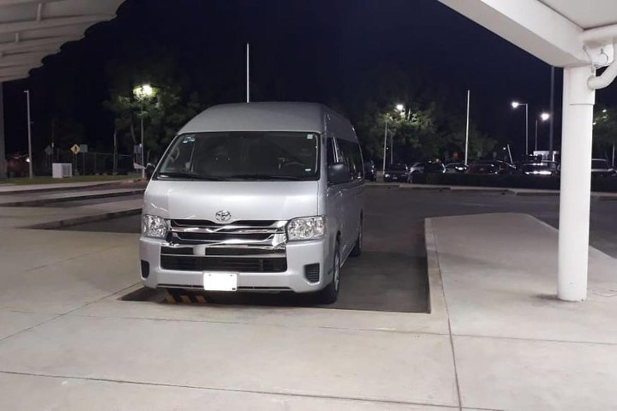a van parked in a parking lot at night