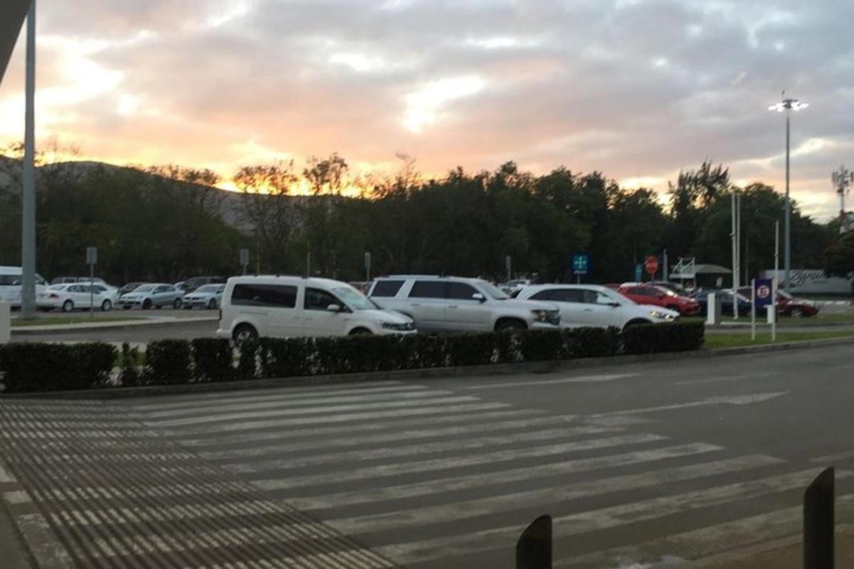 a group of cars parked in a parking lot