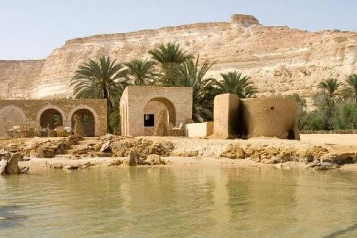a building on the shore of a body of water