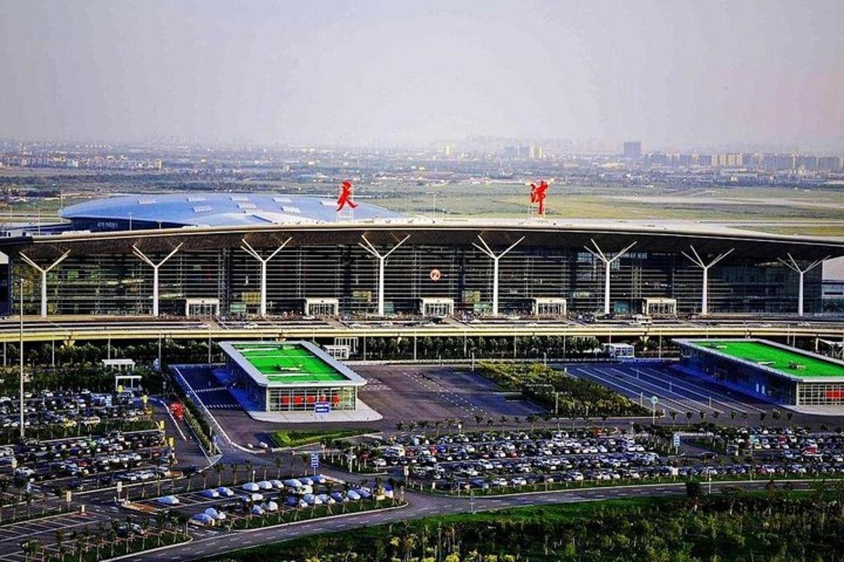 an aerial view of a building with a stadium