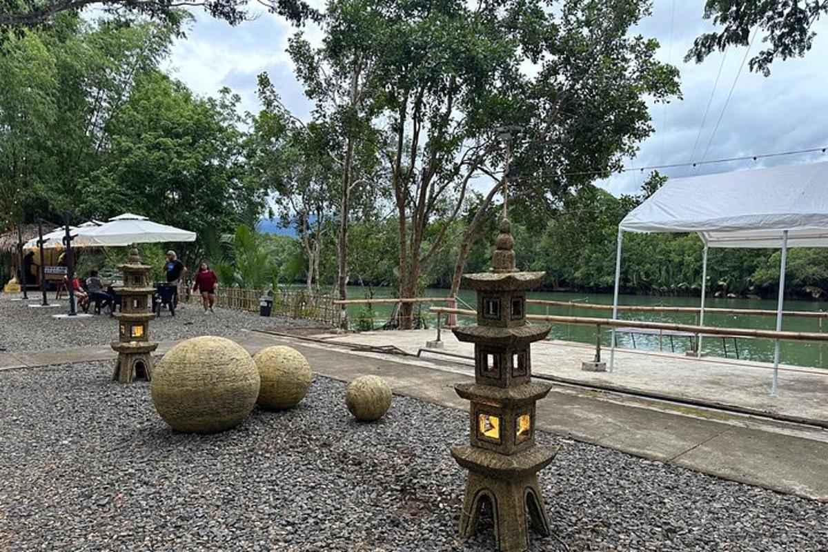 a group of spheres on the ground in a park
