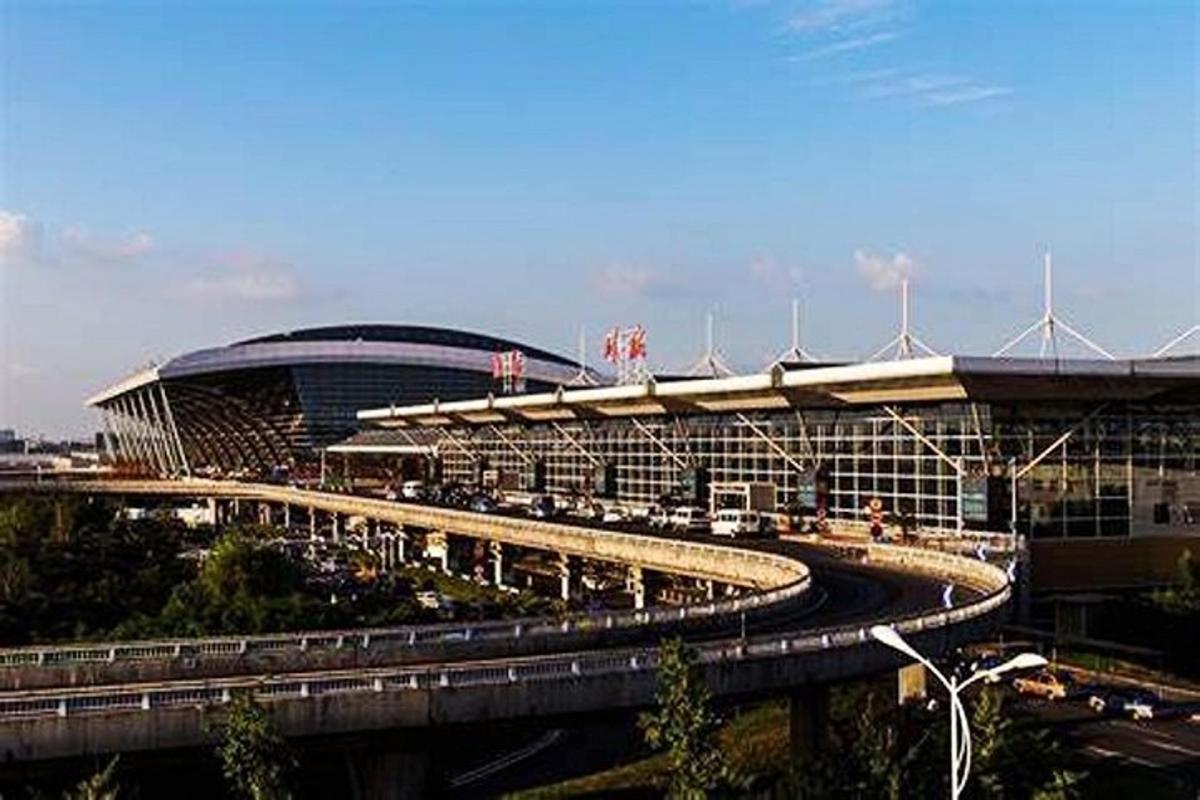 a large building with a road in front of it