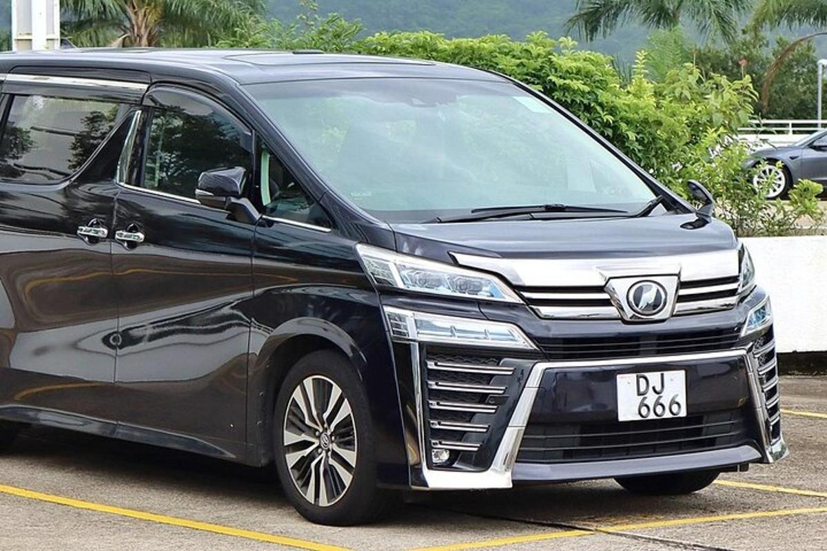 a black van parked in a parking lot