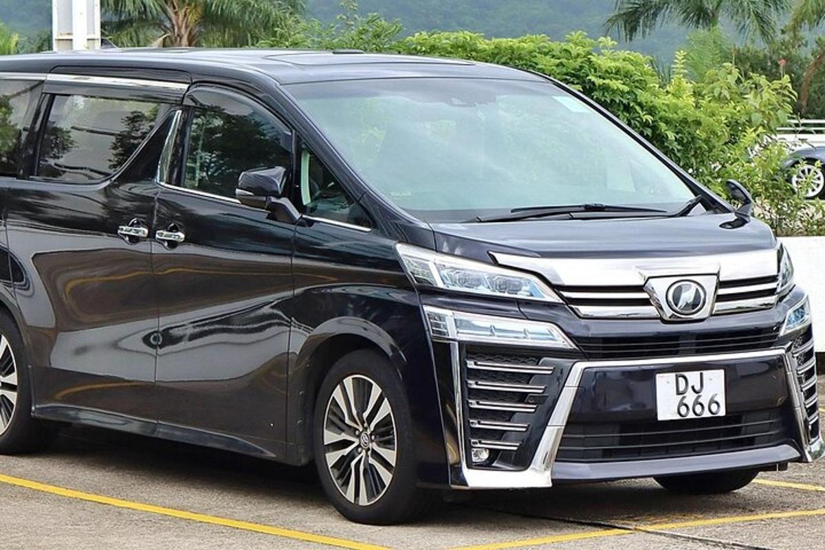 a black van parked in a parking lot