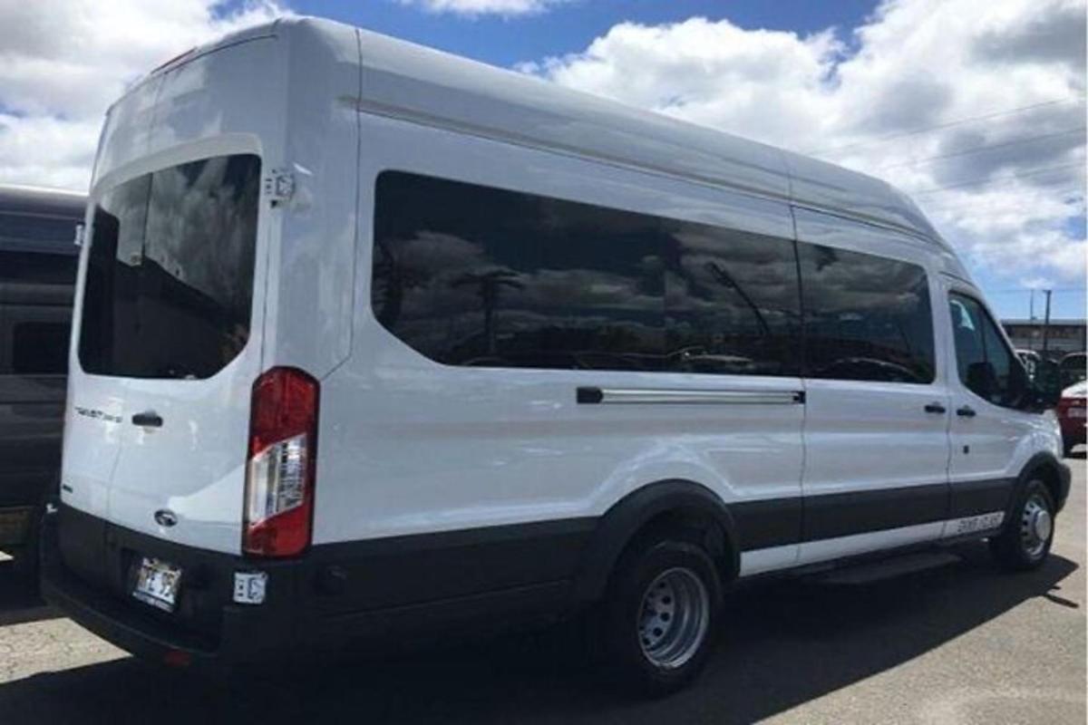 a white van parked in a parking lot