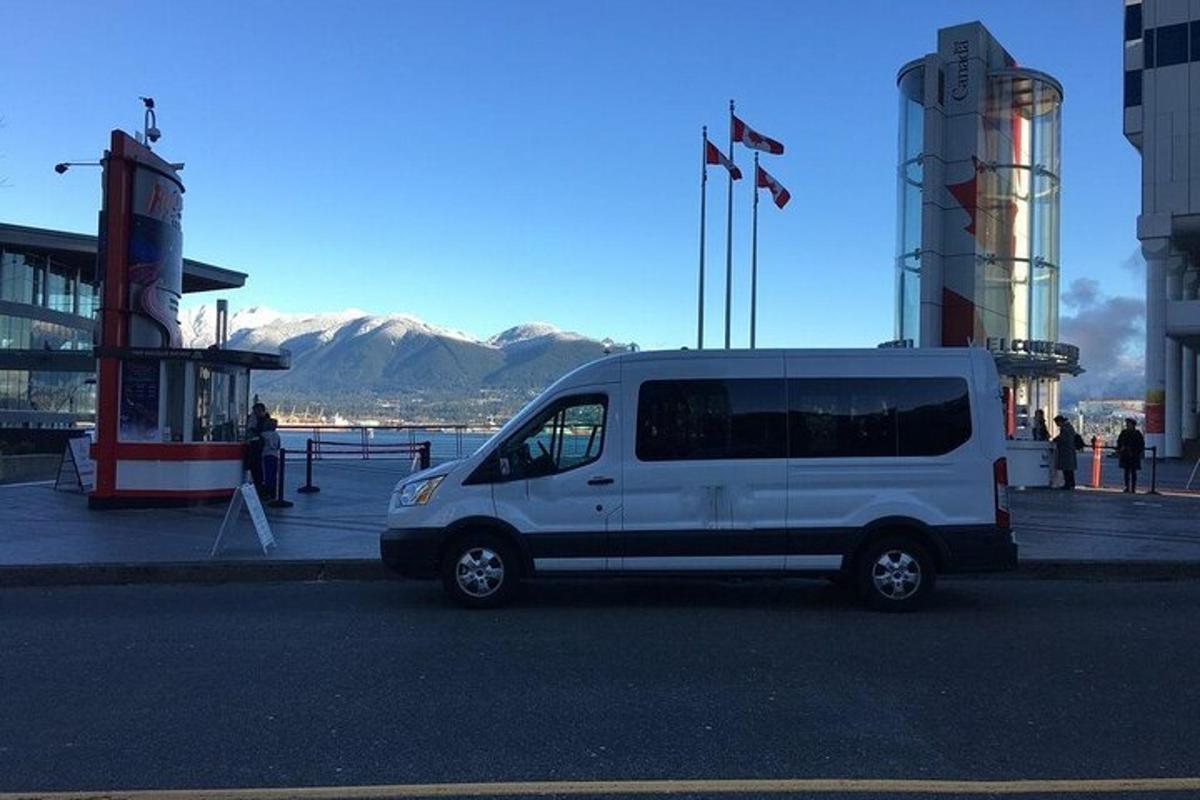 a white van parked in front of a building