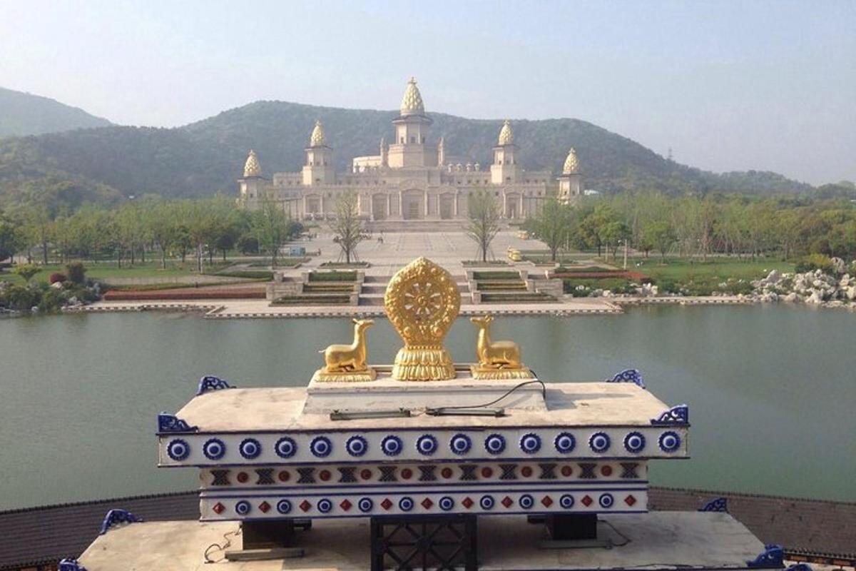 a large building in the middle of a lake