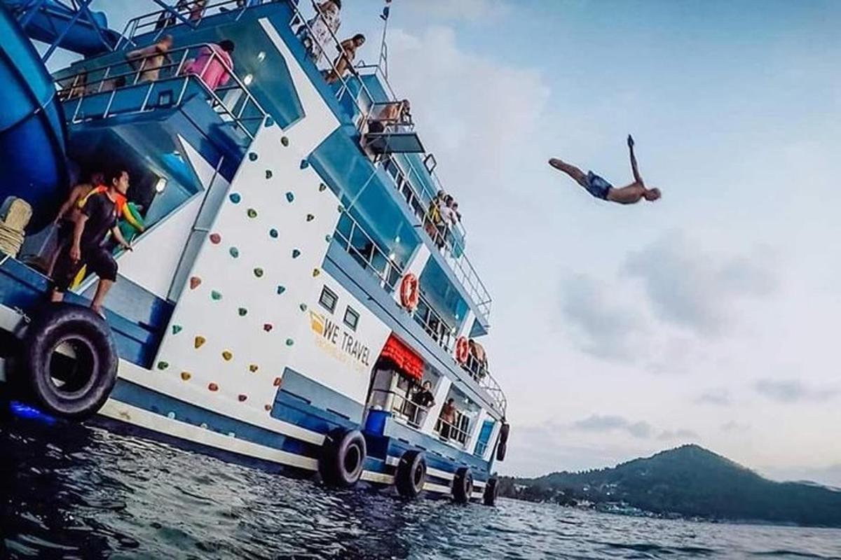 a person jumping off of a boat in the water