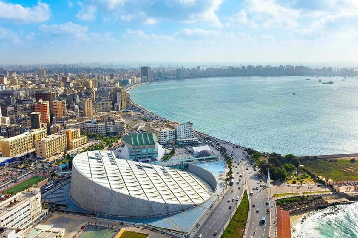 an aerial view of a soccer stadium next to the ocean