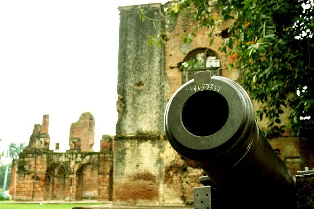 an old building with a black object in front of it