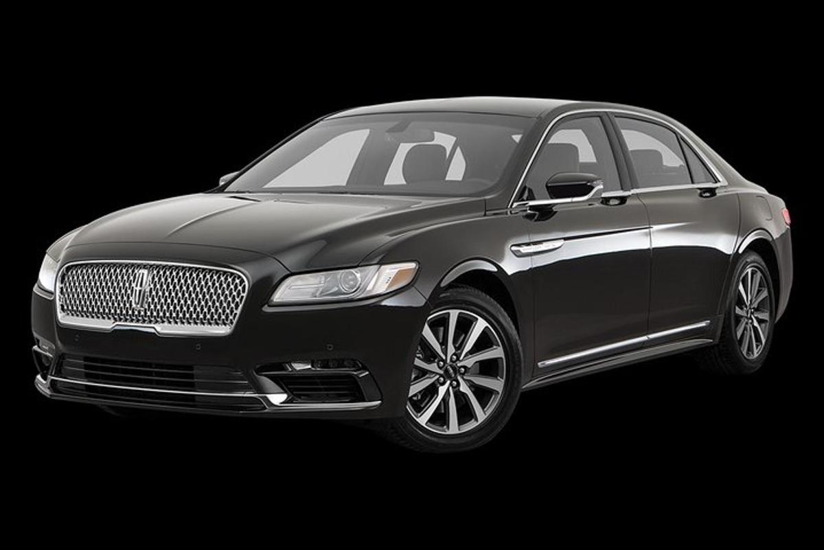 a black luxury car in a black background