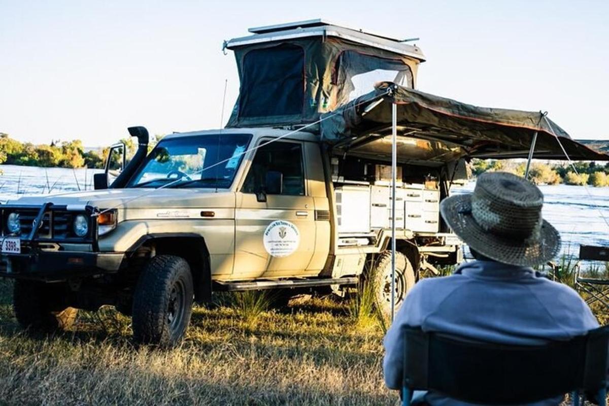 a truck with a camper on the back of it