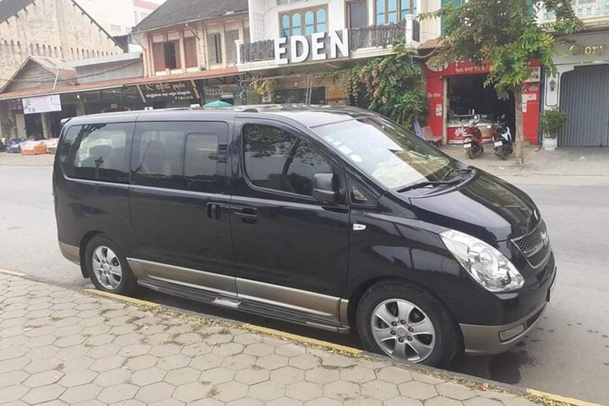 a black van parked on the side of a street