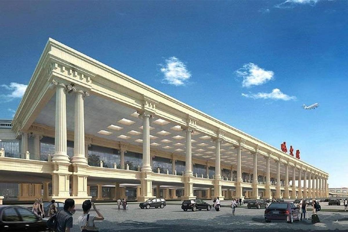 a large building with people walking in front of it