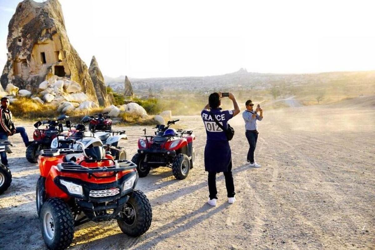 a man is taking a picture of a group of motorcycles