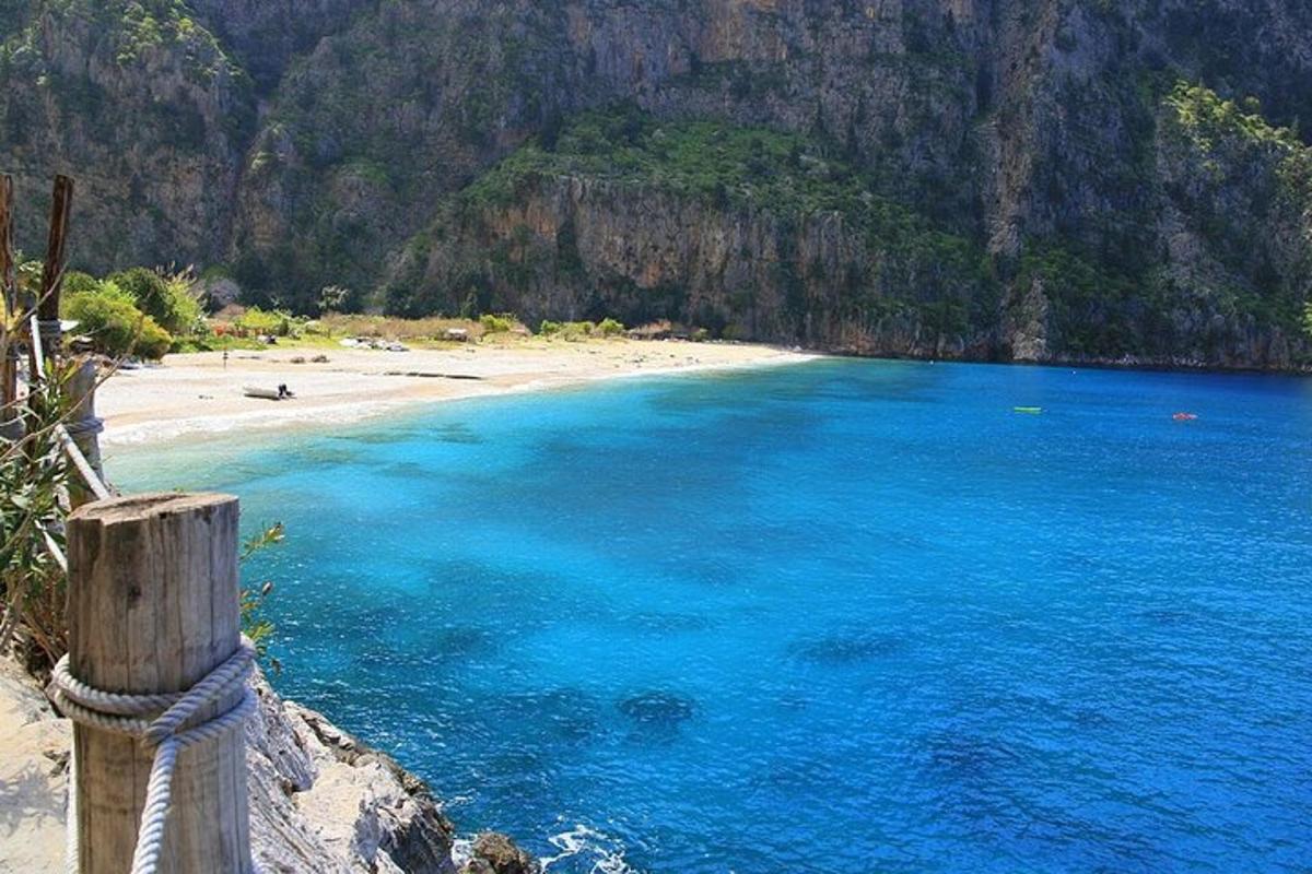 a view of a beach with blue water