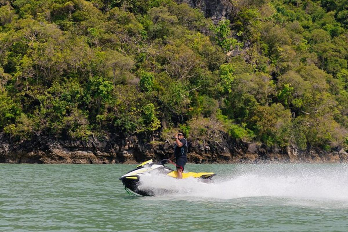 a man on a jet ski in the water