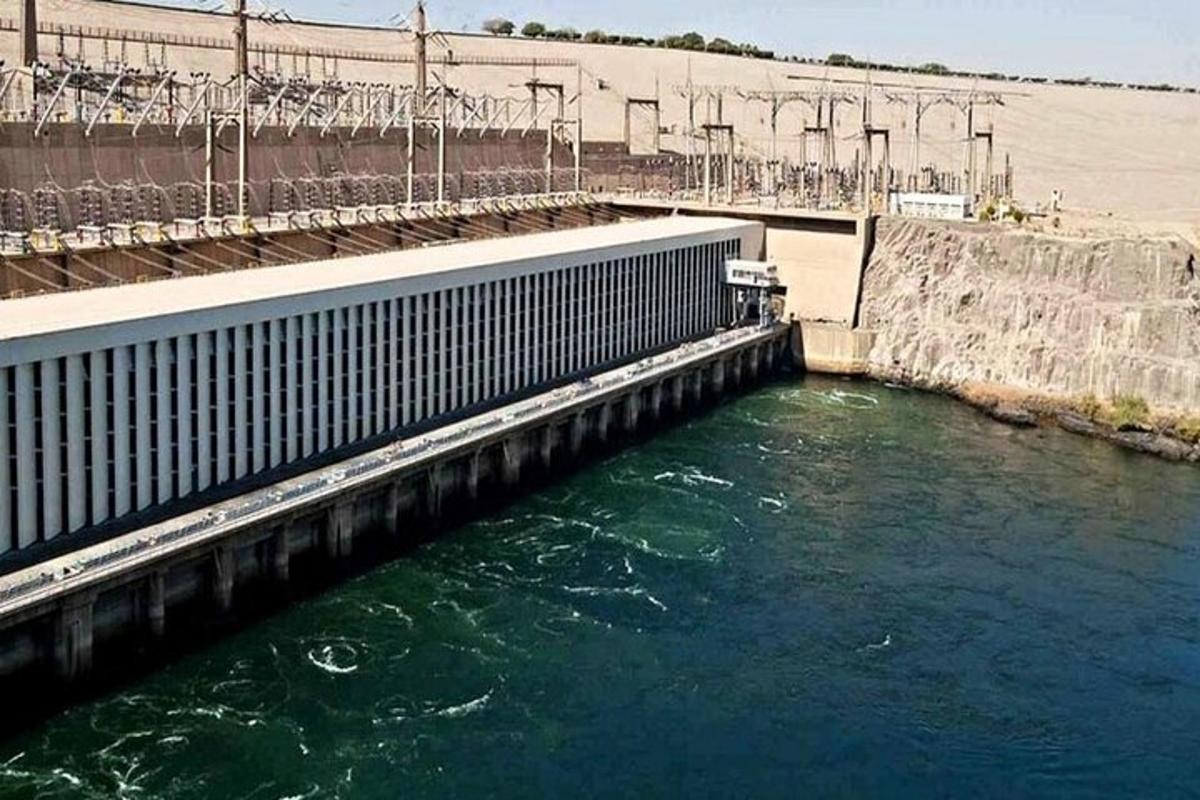 a large dam with water in a river